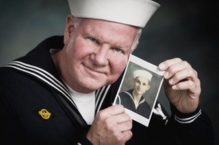 Gary Vidito in sailor outfit with picture of his father