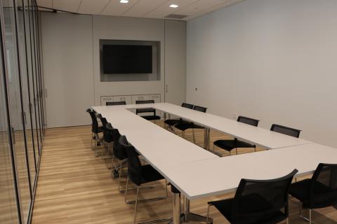 Riverdale Meeting Room set up with 6 tables and 12 chairs