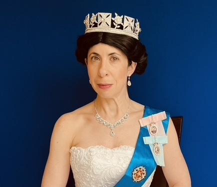Sheryl Faye as Queen Elizabeth II