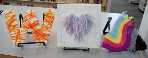 A variety of yarn art crafts.