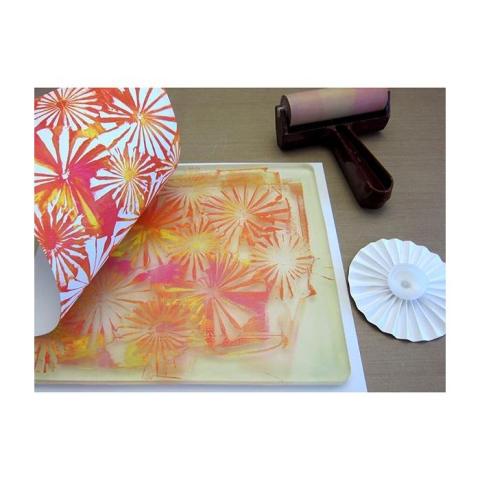 Page being peeled from the gelli print art bock. 