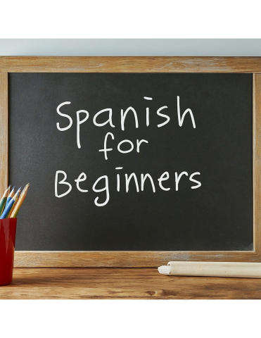 Chalkboard with words "Spanish for Beginners"