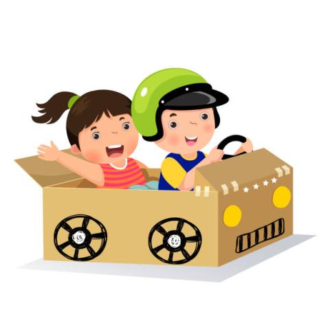 children playing in carboard car